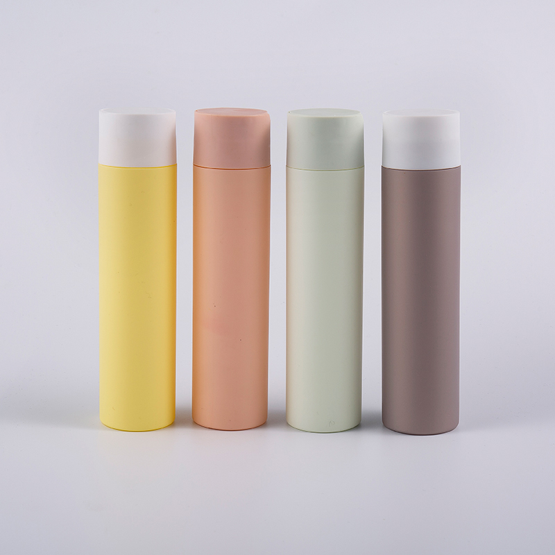 Többszínű, lágy tapintású, kerek alakú 250 ml-es tisztító flakon lemez kupakkal