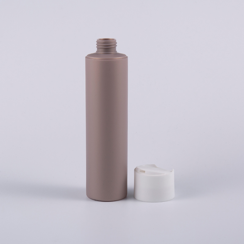 Többszínű, lágy tapintású, kerek alakú 250 ml-es tisztító flakon lemez kupakkal Többszínű, lágy tapintású, kerek alakú 250 ml-es tisztító flakon lemez kupakkal