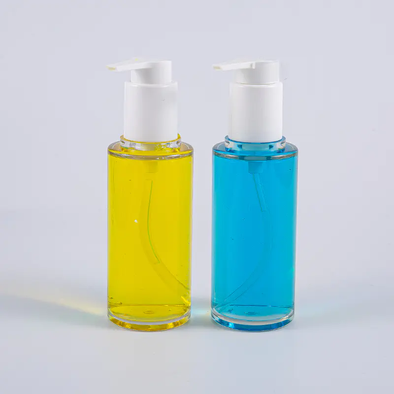Átlátszó PETG 100 ml-es kerek formájú lotionpalack fehér műanyag pumpával