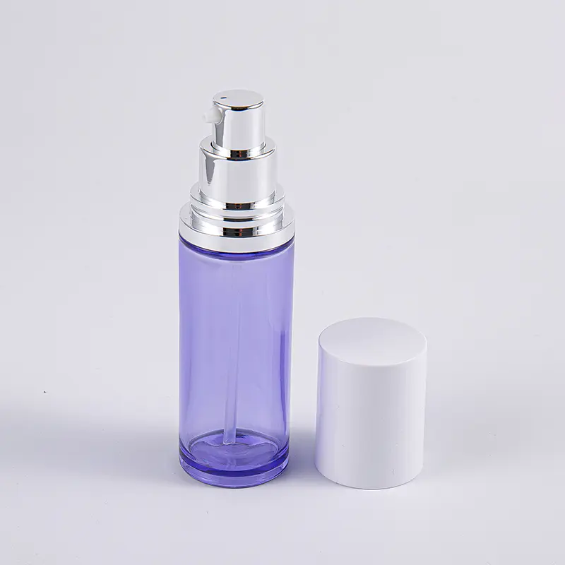 Lila színű 100 ml-es kerek szérumos lotionpalack alumínium pumpával